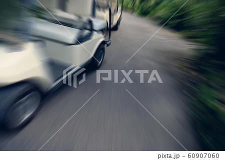 side of golf cart and light on the road 60907060