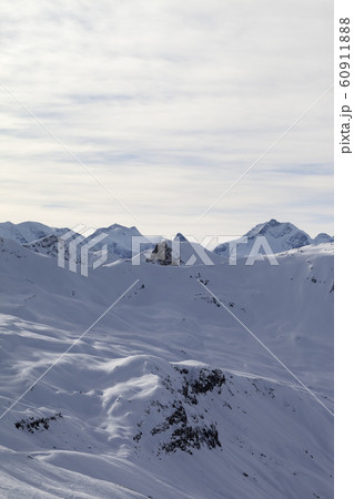Snowy off-piste ski slope at high winter mountains 60911888