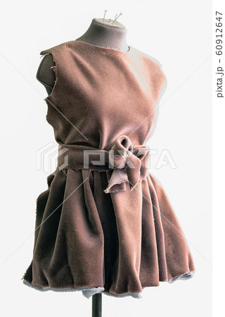 women sewing mannequin with rag dress isolated on 60912647