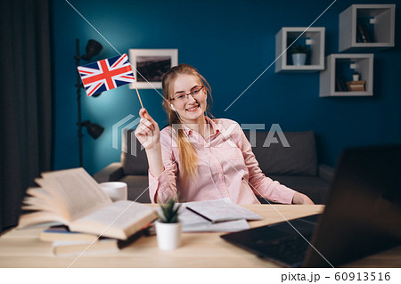 Cheerful Young Ginger Student Girl in Glasses Cheerful Young Ginger Student Girl in Glasses 60913516
