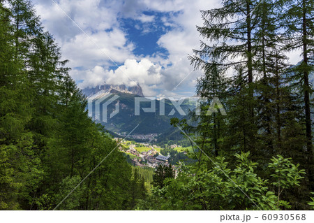 A view of Canazei with the Dolomites peaks in the 60930568