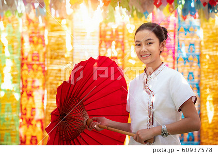 Asian girl in northern traditional costume and red 60937578