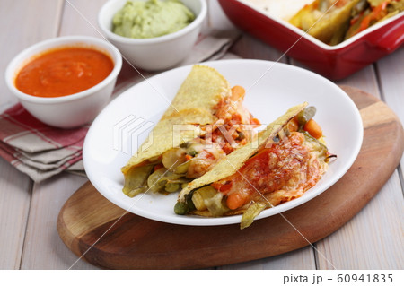 Vegetarian tacos with salsa and guacamole 60941835