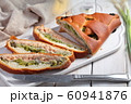 Salmon and broccoli pie on a rustic table 60941876
