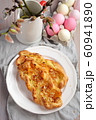 Almond Danish pastry on an Easter table 60941890