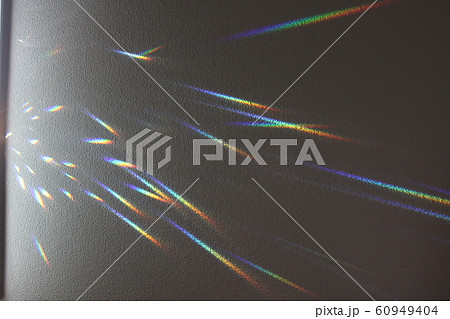 プリズムにより発生した虹色の光の写真素材