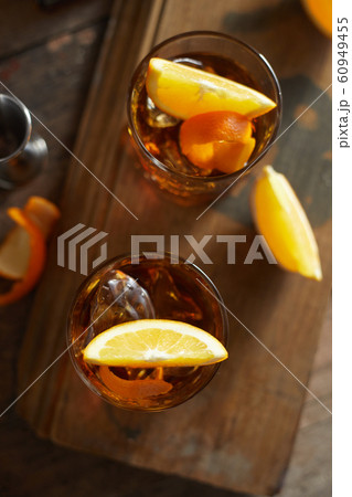 Tasty alcoholic old fashioned cocktail with orange 60949455
