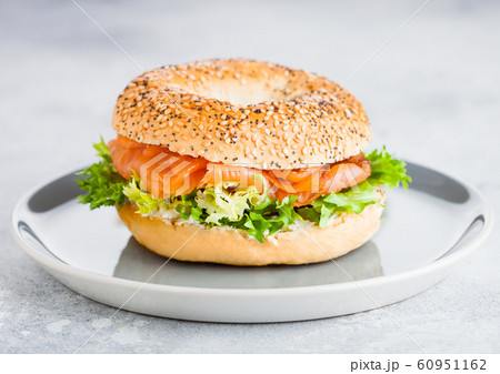 Fresh healthy bagel sandwich with salmon, ricotta Fresh healthy bagel sandwich with salmon, ricotta 60951162