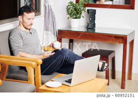 Man enjoying short break after work Man enjoying short break after work 60952151