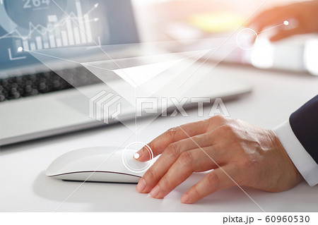 Businessman working with laptop computer, tablet and smart phone. Modern interface online and network connection on virtual screen. 60960530