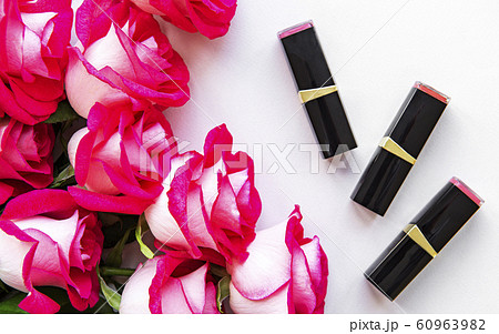Lipsticks and red roses 60963982
