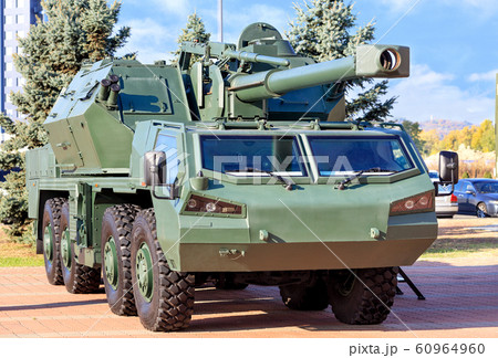 Self-propelled artillery is parked in the parking 60964960