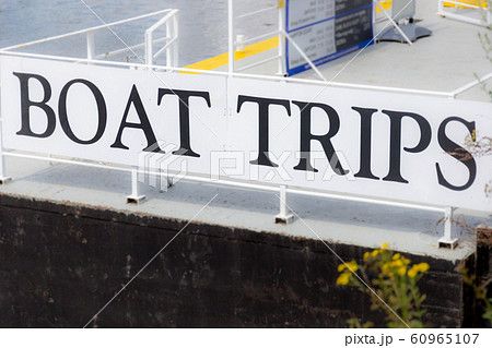 Sign advertising tourist boat trips 60965107
