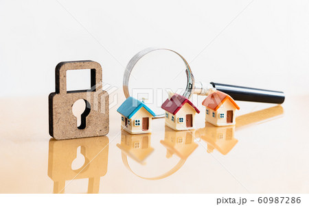 House and magnifying glass for search and explore real estate. House and magnifying glass for search and explore real estate. 60987286