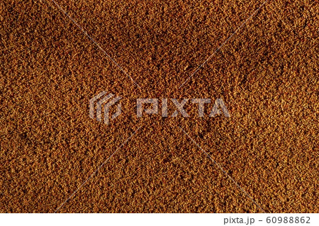 Distressed overlay texture of cracked concrete, stone or asphalt. Grunge colorful background.  Small grains of sand as a wallpaper. 60988862