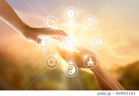 Religion concept. Human hands together forgives and blesses. Praying and religions icon on sky sunset background 60993163