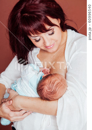 mom feeding babe the son of breast milk mom feeding babe the son of breast milk 60996540