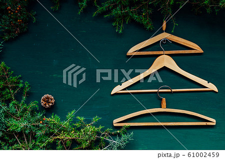 old hangers clothing on a green background old hangers clothing on a green background 61002459