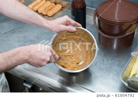 pastry cook prepares the dough pastry cook prepares the dough 61004792