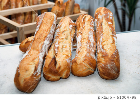 French breads in a bakery market French breads in a bakery market 61004798