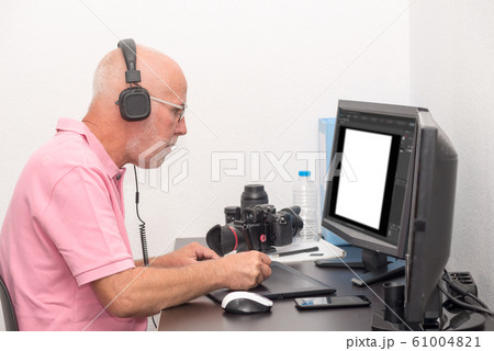 man designer using graphics tablet for editing man designer using graphics tablet for editing 61004821
