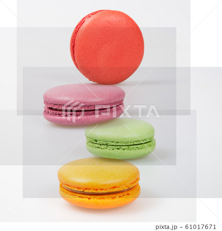 macarons or colorful macarons on a background. macarons or colorful macarons on a background. 61017671