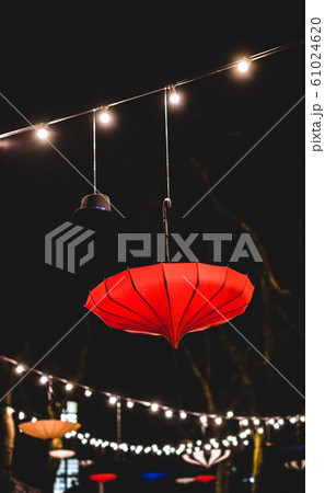 colorful umbrellas street Umbrellas decoration with light in dark sky background night fairy lights festival winter 61024620