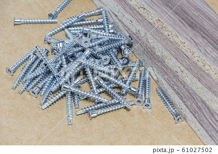 Screw-on for furniture. Metal screw. Vertical. Screw-on for furniture. Metal screw. Vertical. 61027502