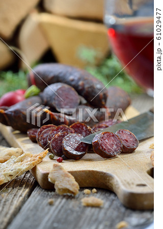 South Tyrolean snack with red wine 61029477