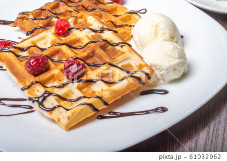 Viennese waffles with ice cream, chocolate and 61032962