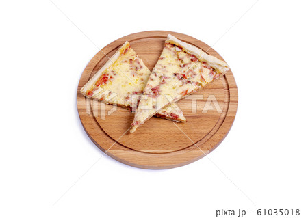 pizza on a wooden board pizza on a wooden board 61035018