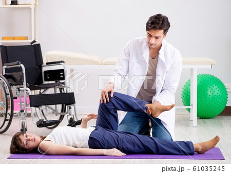 Patient recovering in hospital after injury trauma 61035245