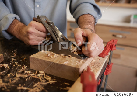 Worker working with grinder saw Worker working with grinder saw 61036097