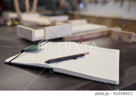 Writing plans in note pad Writing plans in note pad 61036651