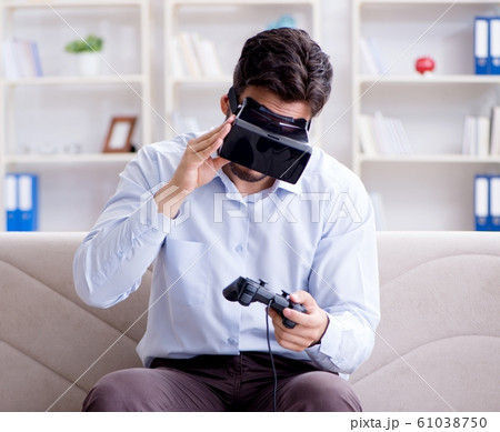 Student gamer playing games at home Student gamer playing games at home 61038750