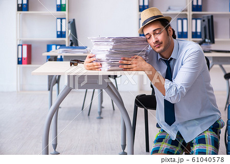 Young employee escaping for summer vacation 61040578