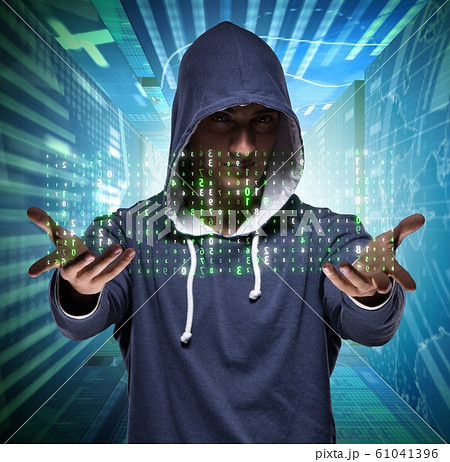 Young hacker in cyber security concept Young hacker in cyber security concept 61041396