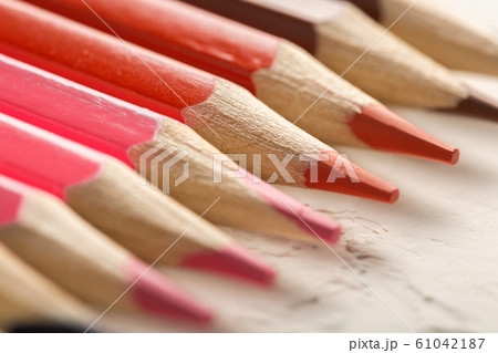 colored pencils on white background close-up 61042187