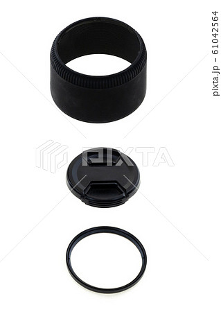 lens hood, lens cap and lens on an isolated lens hood, lens cap and lens on an isolated 61042564