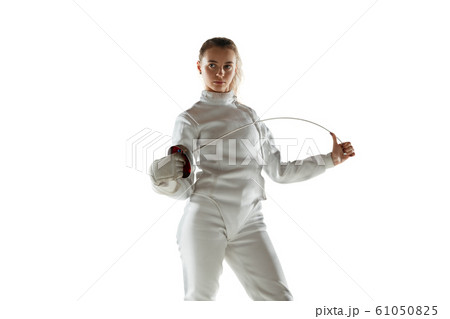 Teen girl in fencing costume with sword in hand isolated on white background Teen girl in fencing costume with sword in hand isolated on white background 61050825