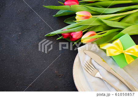 Festive Table Setting With Tulips for Birthday, Mother's Day or for another holiday. 61050857