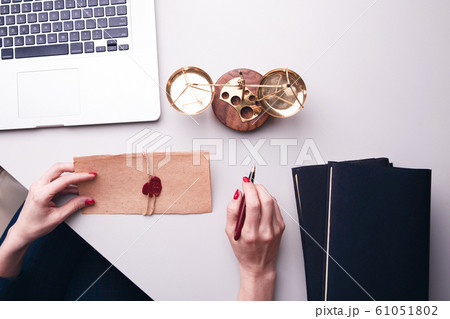 Notary paper concept. Documents in woman's hands. 61051802
