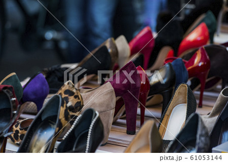 Different shoes in a market in Milan Different shoes in a market in Milan 61053144