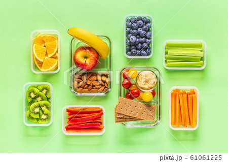 Healthy snack on a pastel background. Healthy snack on a pastel background. 61061225
