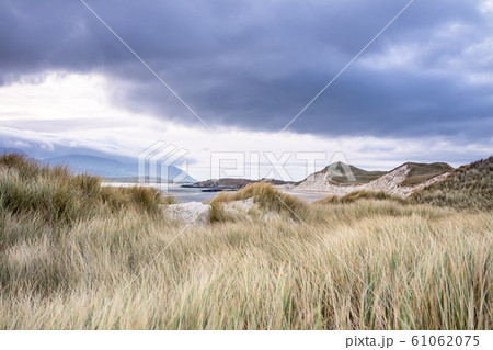 Dunes at the Sheskinmore Nature Reserve between Ardara and Portnoo in Donegal - Ireland Dunes at the Sheskinmore Nature Reserve between Ardara and Portnoo in Donegal - Ireland 61062075