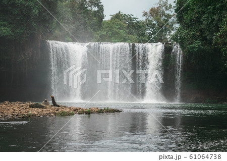 Tad Thum Jum Pee Waterfall in Paksong District 61064738