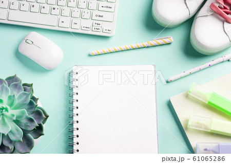 Mint back to school flat lay frame with notepad 61065286