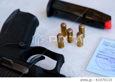 a pistol 9 mm and bullets to him a pistol 9 mm and bullets to him 61070110