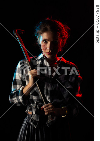 woman with crowbar woman with crowbar 61077638