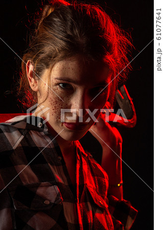 woman with crowbar 61077641